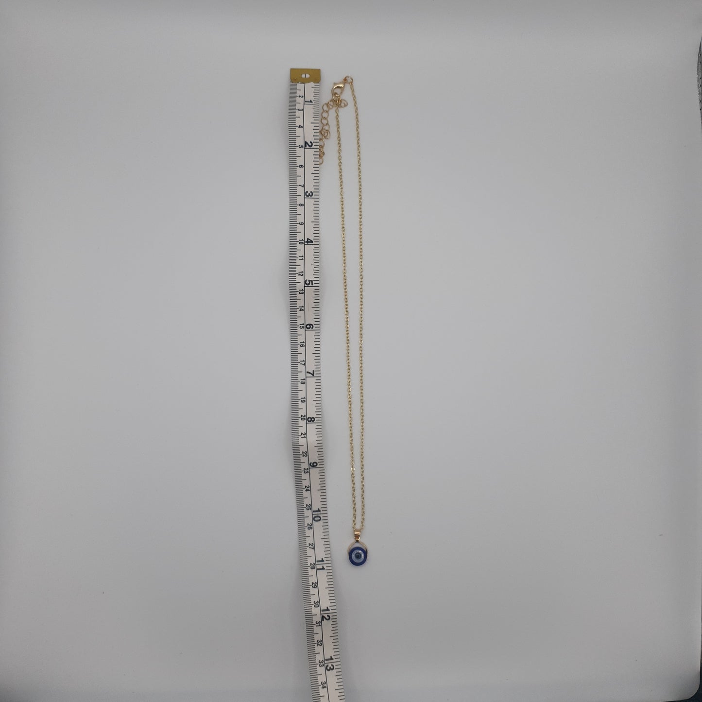 Evil eye pendant and necklace