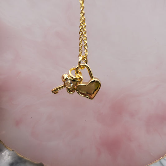 Heart and key gold necklace